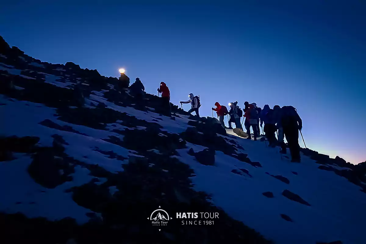 The group climbs to the top of Ararat